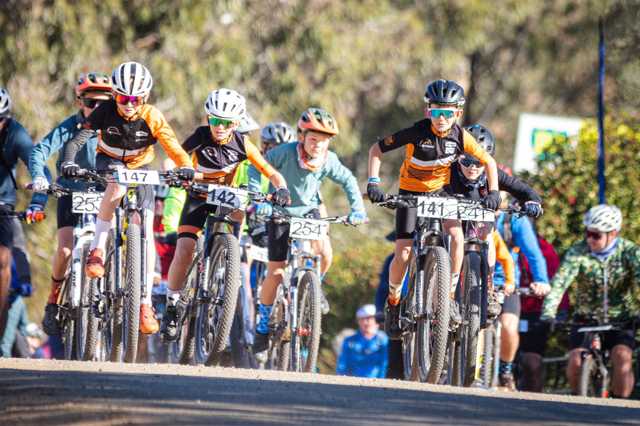 Young riders racing together